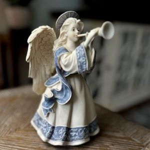 Angel with Trumpet, music stand